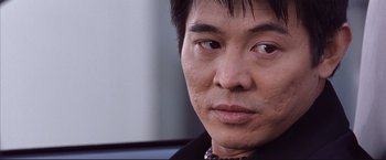 Movie still from “Cradle 2 the Grave” (2003), directed by Andrzej Bartkowiak – A man's eyes and face; Close Up shot, Low angle