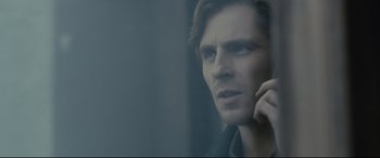 Movie still from “The Girl in the Spider's Web” (2018), directed by Fede Alvarez – A person talking on a cell phone; Close Up shot, Over the shoulder angle