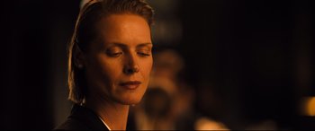 Movie still from “The Girl in the Spider's Web” (2018), directed by Fede Alvarez – A person with her eyes closed; Close Up shot, Over the shoulder angle