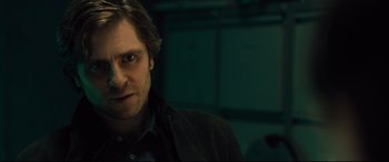 Movie still from “The Girl in the Spider's Web” (2018), directed by Fede Alvarez – A person wearing a jacket; Close Up shot, Over the shoulder angle