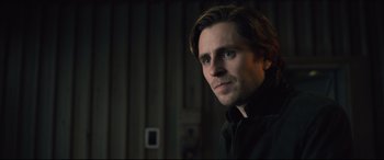 Movie still from “The Girl in the Spider's Web” (2018), directed by Fede Alvarez – A person with long hair; Close Up shot, Over the shoulder angle