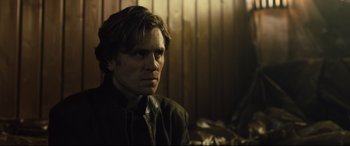 Movie still from “The Girl in the Spider's Web” (2018), directed by Fede Alvarez – A person with long hair; Close Up shot, Over the shoulder angle