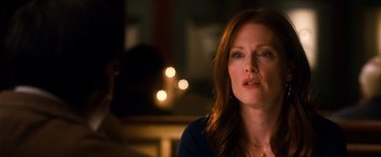 Movie still from “Crazy, Stupid, Love.” (2011), directed by Glenn Ficarra – A person sitting in front of a window; Close Up shot, Over the shoulder angle