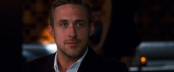 Movie still from “Crazy, Stupid, Love.” (2011), directed by Glenn Ficarra – A person wearing a suit and tie; Close Up shot, Over the shoulder angle