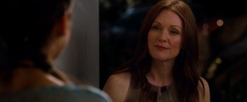 Movie still from “Crazy, Stupid, Love.” (2011), directed by Glenn Ficarra – A person sitting in a room; Close Up shot, Over the shoulder angle