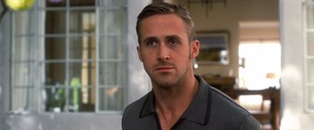 Movie still from “Crazy, Stupid, Love.” (2011), directed by Glenn Ficarra – A person wearing a black shirt; Close Up shot, Over the shoulder angle
