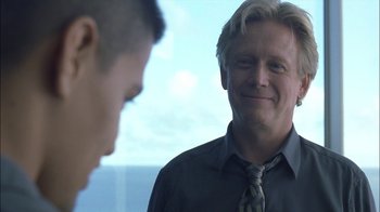 Movie still from “Crazy/Beautiful” (2001), directed by John Stockwell – A man in a suit and tie looking at another man in a tie; Close Up shot, Over the shoulder angle