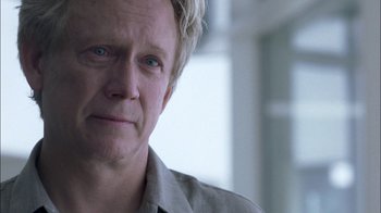 Movie still from “Crazy/Beautiful” (2001), directed by John Stockwell – A person wearing a gray shirt; Close Up shot, Over the shoulder angle