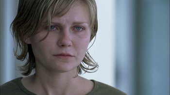 Movie still from “Crazy/Beautiful” (2001), directed by John Stockwell – A person wearing a green shirt; Close Up shot, Over the shoulder angle