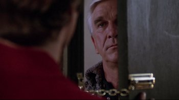 Movie still from “Creepshow” (1982), directed by George A. Romero – An older man looking at himself in a mirror; Close Up shot, Over the shoulder angle