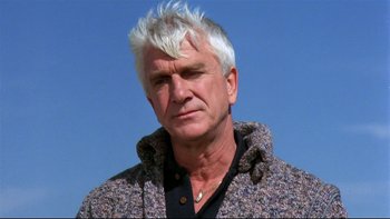 Movie still from “Creepshow” (1982), directed by George A. Romero – A person wearing a jacket; Close Up shot, Low angle