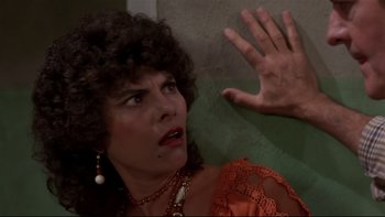 Movie still from “Creepshow” (1982), directed by George A. Romero – A person holding their hand up; Close Up shot, Low angle