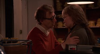 Movie still from “Crimes and Misdemeanors” (1989), directed by Woody Allen – A man and a woman are looking at each other; Close Up shot, Low angle