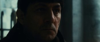 Movie still from “Crimson Rivers 2: Angels of the Apocalypse” (2004), directed by Olivier Dahan – A man's face in the dark; Close Up shot, Low angle