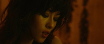 Movie still from “Crimson Rivers 2: Angels of the Apocalypse” (2004), directed by Olivier Dahan – A woman's face in the dark; Close Up shot, Low angle