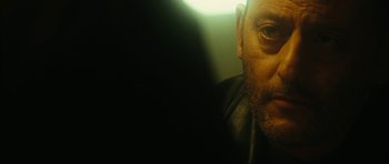 Movie still from “Crimson Rivers 2: Angels of the Apocalypse” (2004), directed by Olivier Dahan – A person wearing a leather jacket; Close Up shot, Over the shoulder angle
