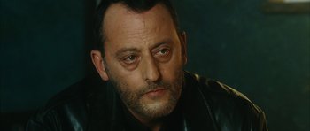Movie still from “Crimson Rivers 2: Angels of the Apocalypse” (2004), directed by Olivier Dahan – A person wearing a leather jacket; Close Up shot, High angle