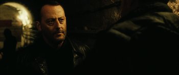 Movie still from “Crimson Rivers 2: Angels of the Apocalypse” (2004), directed by Olivier Dahan – A person wearing a leather jacket; Close Up shot, Over the shoulder angle