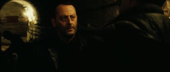 Movie still from “Crimson Rivers 2: Angels of the Apocalypse” (2004), directed by Olivier Dahan – A person wearing a black shirt; Close Up shot, Over the shoulder angle