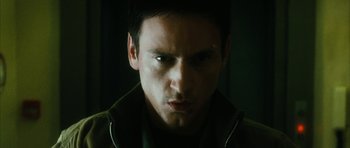 Movie still from “Crimson Rivers 2: Angels of the Apocalypse” (2004), directed by Olivier Dahan – A person with his eyes wide open; Close Up shot, Low angle