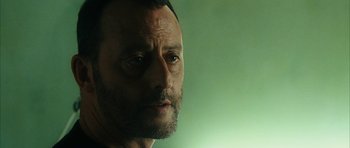 Movie still from “Crimson Rivers 2: Angels of the Apocalypse” (2004), directed by Olivier Dahan – A man's face in a green room; Close Up shot, Low angle
