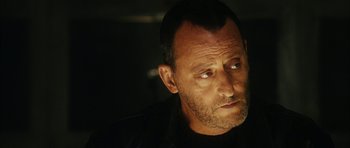 Movie still from “Crimson Rivers 2: Angels of the Apocalypse” (2004), directed by Olivier Dahan – A person looking at the camera; Close Up shot, Over the shoulder angle