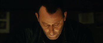 Movie still from “Crimson Rivers 2: Angels of the Apocalypse” (2004), directed by Olivier Dahan – A person with his eyes closed; Close Up shot, Overhead angle