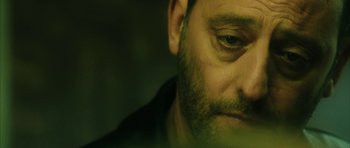 Movie still from “Crimson Rivers 2: Angels of the Apocalypse” (2004), directed by Olivier Dahan – A person with a beard; Extreme Close Up shot, Over the shoulder angle