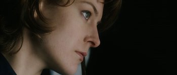 Movie still from “Crimson Rivers 2: Angels of the Apocalypse” (2004), directed by Olivier Dahan – A woman's face with green eyes; Extreme Close Up shot, Low angle