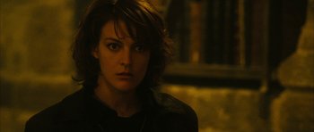 Movie still from “Crimson Rivers 2: Angels of the Apocalypse” (2004), directed by Olivier Dahan – A person with short hair; Close Up shot, Over the shoulder angle