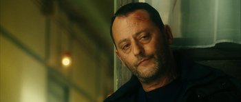 Movie still from “Crimson Rivers 2: Angels of the Apocalypse” (2004), directed by Olivier Dahan – A person wearing a black shirt; Close Up shot, Low angle