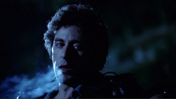 Movie still from “Cruising” (1980), directed by William Friedkin – A person wearing a jacket; Close Up shot, Low angle