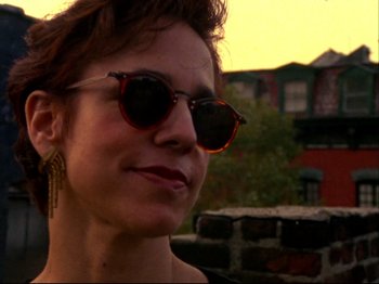 Movie still from “Crumb” (1994), directed by Terry Zwigoff – A person wearing sunglasses; Close Up shot, Low angle