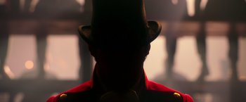 Movie still from “The Greatest Showman” (2017), directed by Michael Gracey – A man in a top hat and a red jacket; Close Up shot, Low angle