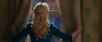 Movie still from “The Greatest Showman” (2017), directed by Michael Gracey – A woman with long blonde hair looking out of a window; Close Up shot, Over the shoulder angle