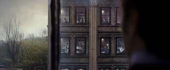 Movie still from “The Greatest Showman” (2017), directed by Michael Gracey – A group of people sitting in a building with many windows; Wide shot, High angle