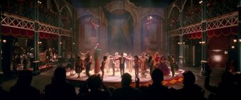 Movie still from “The Greatest Showman” (2017), directed by Michael Gracey – A group of people standing on a stage; Extreme Wide shot, High angle
