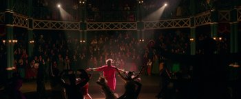 Movie still from “The Greatest Showman” (2017), directed by Michael Gracey – A crowd of people watching a performer on stage; Extreme Wide shot, High angle