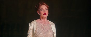 Movie still from “The Greatest Showman” (2017), directed by Michael Gracey – A woman with red hair wearing a white dress; Medium shot, Low angle