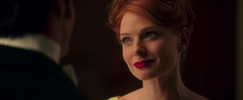 Movie still from “The Greatest Showman” (2017), directed by Michael Gracey – A person with red hair and green eyes; Close Up shot, Over the shoulder angle