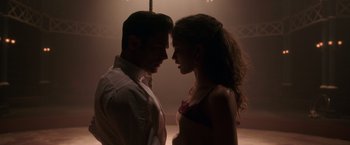 Movie still from “The Greatest Showman” (2017), directed by Michael Gracey – A man and a woman standing next to each other; Medium shot, Overhead angle