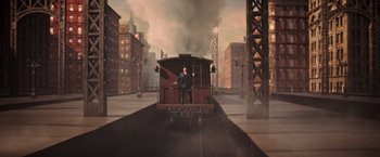 Movie still from “The Greatest Showman” (2017), directed by Michael Gracey – A man standing on top of a train car; Extreme Wide shot, High angle