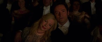 Movie still from “The Greatest Showman” (2017), directed by Michael Gracey – A man and a woman posing for a picture in front of a crowd; Close Up shot, High angle