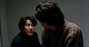 A man and a woman talking to each other