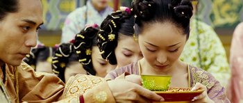 Movie still from “Curse of the Golden Flower” (2006), directed by Yimou Zhang – A group of young women holding a cup of tea; Close Up shot, Low angle