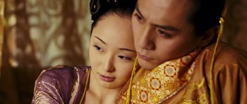 Movie still from “Curse of the Golden Flower” (2006), directed by Yimou Zhang – A man and a woman are looking at each other; Close Up shot, Low angle