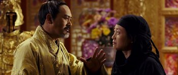 Movie still from “Curse of the Golden Flower” (2006), directed by Yimou Zhang – A man and a woman talking to each other; Medium shot, Over the shoulder angle