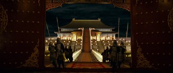 Movie still from “Curse of the Golden Flower” (2006), directed by Yimou Zhang – A group of people standing on a bridge at night; Extreme Wide shot, High angle