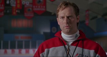 Movie still from “D3: The Mighty Ducks” (1996), directed by Robert Lieberman – A person wearing a sweater; Close Up shot, Low angle