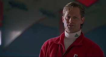Movie still from “D3: The Mighty Ducks” (1996), directed by Robert Lieberman – A person wearing a red jacket; Close Up shot, Low angle
